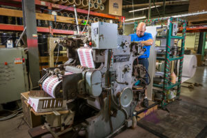 Setting the press on a Tagline sheeter